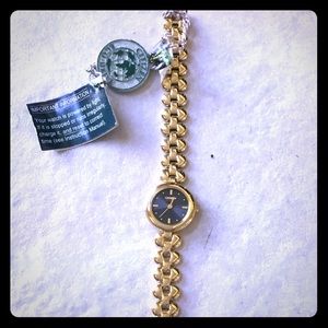 Citizen Women's Gold Tone Watch with Black Face